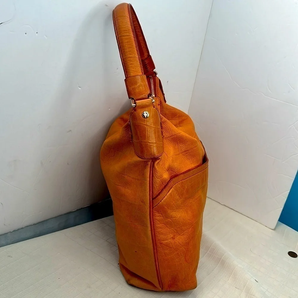 Cole Haan pop of color orange creamsicle leather hobo bag